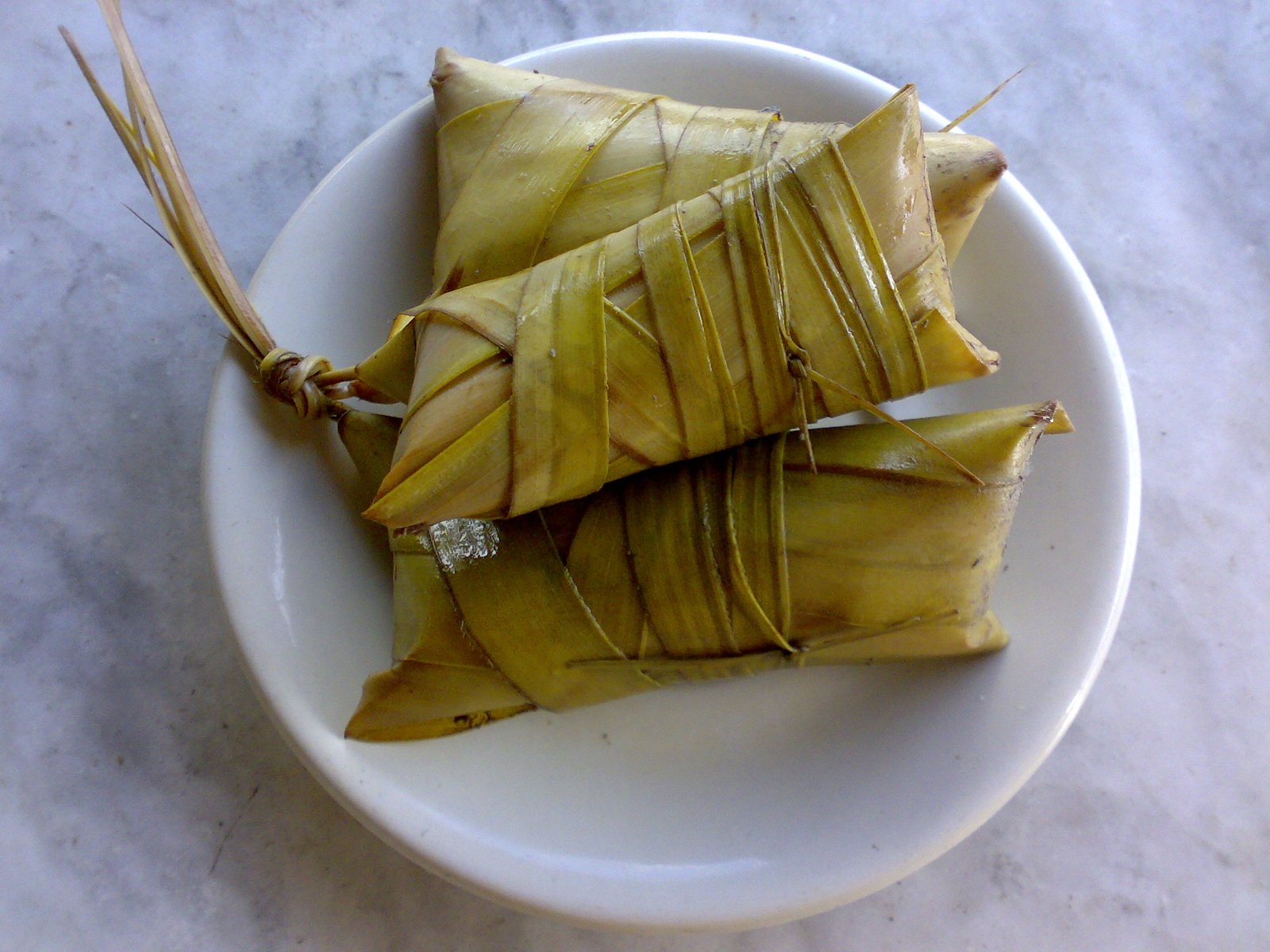 Suman (Sticky Rice Cake in Banana Leaf) photo